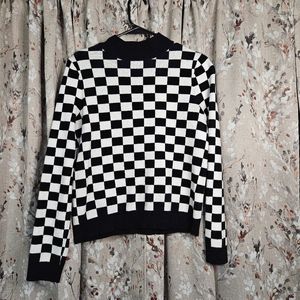 checkerboard mock neck sweater